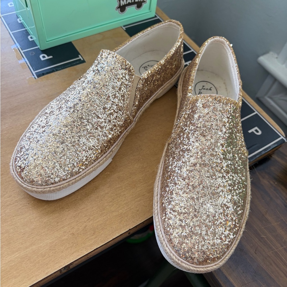 Jack Rogers Tucker gold glitter slip-on sneakers.